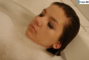 The girl in the bathroom plays with wax. Thumb 15