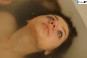 The girl in the bathroom plays with wax. Thumb 38