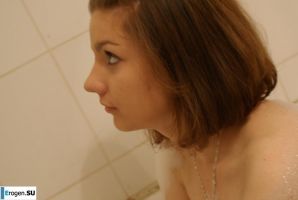 The girl in the bathroom plays with wax. Thumb 8