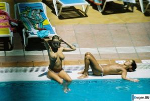 Girls sunbathe topless near the pool. Thumb 10