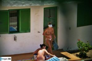 Girls sunbathe topless near the pool. Thumb 33