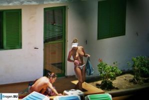 Girls sunbathe topless near the pool. Thumb 34