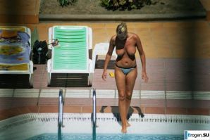 Girls sunbathe topless near the pool. Part 2. Thumb 12
