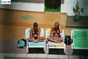 Girls sunbathe topless near the pool. Part 2. Thumb 18