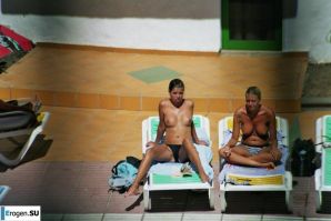 Girls sunbathe topless near the pool. Part 2. Thumb 19