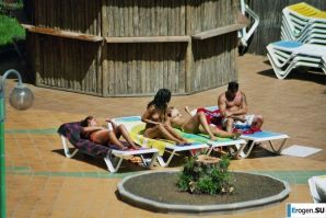 Girls sunbathe topless near the pool. Part 2. Thumb 21