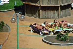 Girls sunbathe topless near the pool. Part 2. Thumb 26