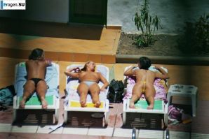 Girls sunbathe topless near the pool. Part 2. Thumb 27