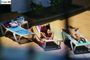 Girls sunbathe topless near the pool. Part 2. Thumb 30