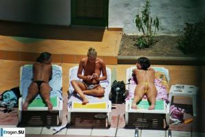 Girls sunbathe topless near the pool. Part 2. Thumb 32