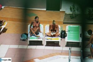 Girls sunbathe topless near the pool. Part 2. Thumb 6