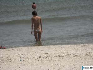 Topless thin girl on the beach. Thumb 32