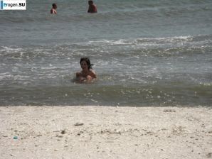 Topless thin girl on the beach. Thumb 36