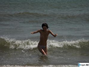 Topless thin girl on the beach. Thumb 37