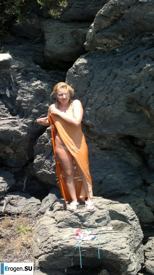 naked on the rocky shores. Photo 32