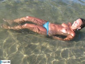 tanned girlfriends on a rocky shore. Thumb 17