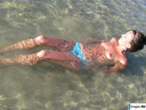 tanned girlfriends on a rocky shore. Thumb 18