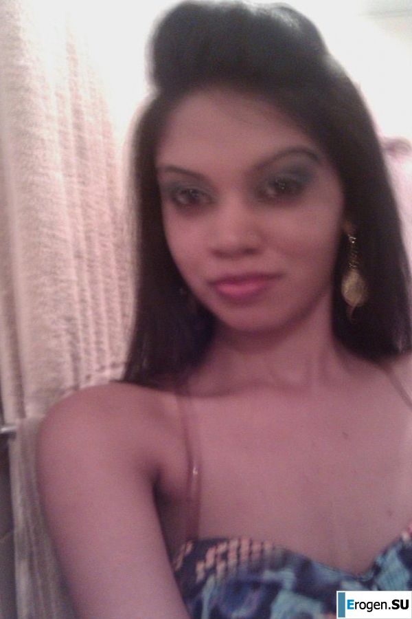 slim dark-skinned girl undresses. Photo 18