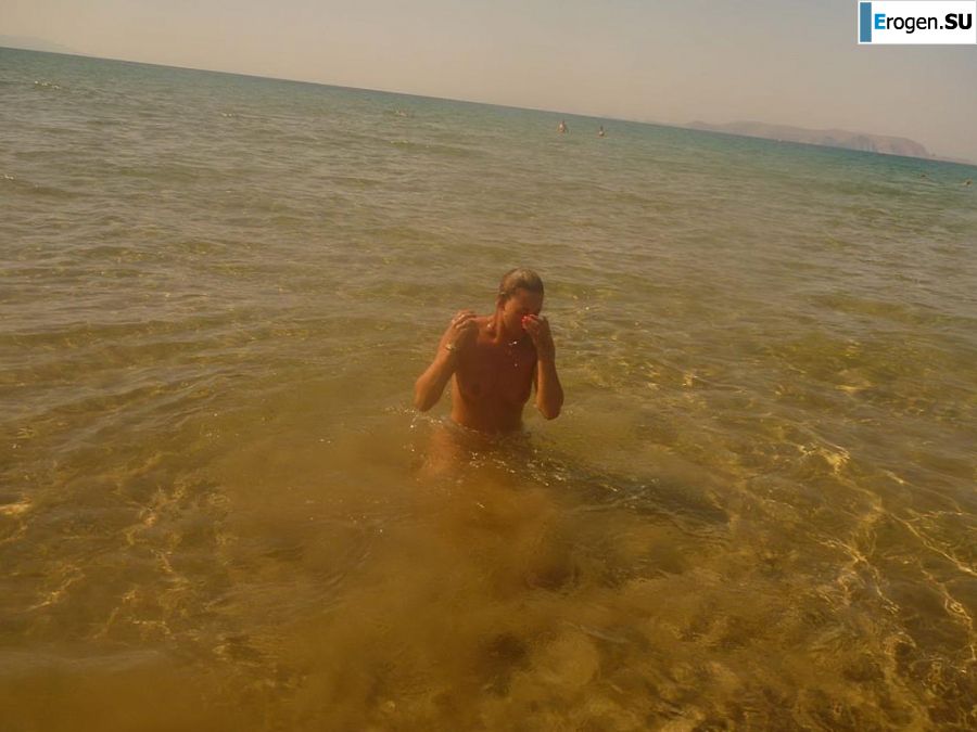fun on a nudist beach. Photo 35