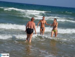 fun on a nudist beach. Thumb 12