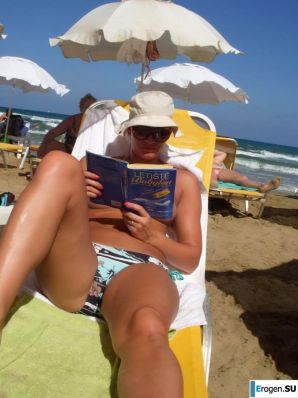 fun on a nudist beach. Thumb 14