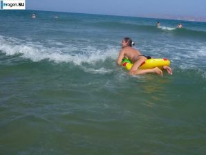 fun on a nudist beach. Thumb 19