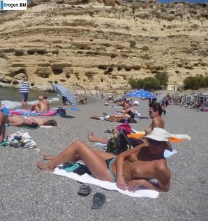 fun on a nudist beach. Thumb 36