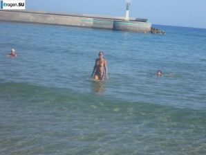 fun on a nudist beach. Thumb 38