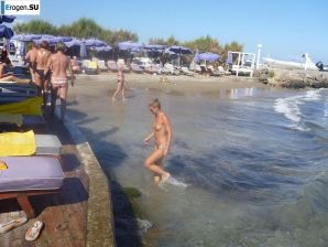 fun on a nudist beach. Thumb 39