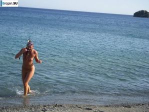 fun on a nudist beach. Thumb 8