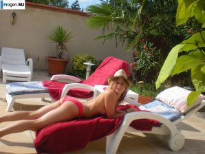 mischievous minx on the beach. Thumb 3