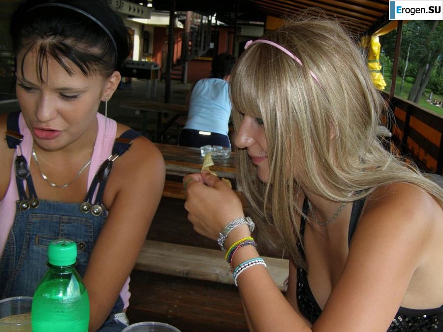 two girlfriends without bras by the river. Photo 27