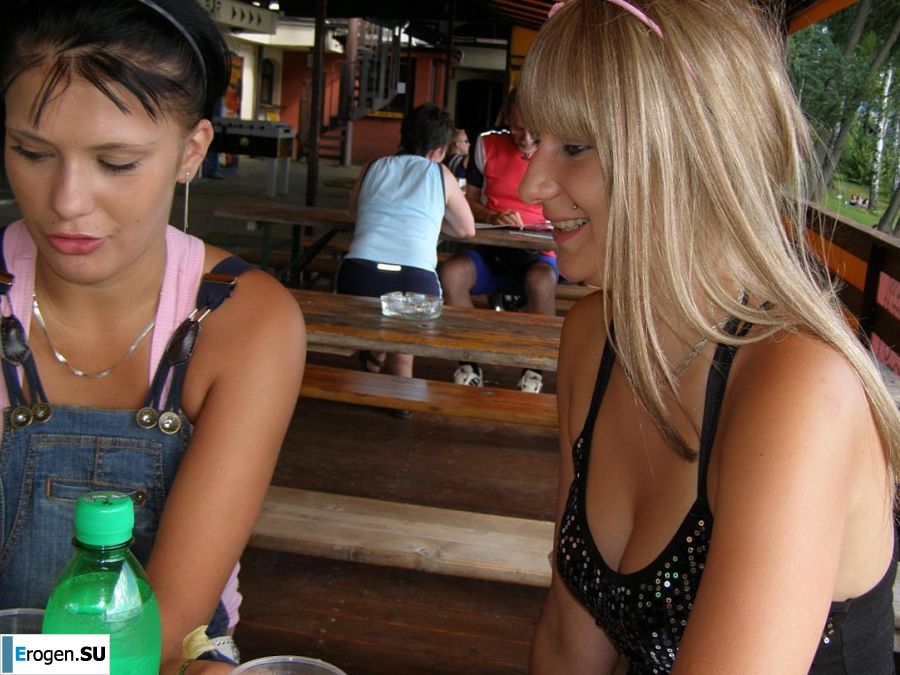 two girlfriends without bras by the river. Photo 28