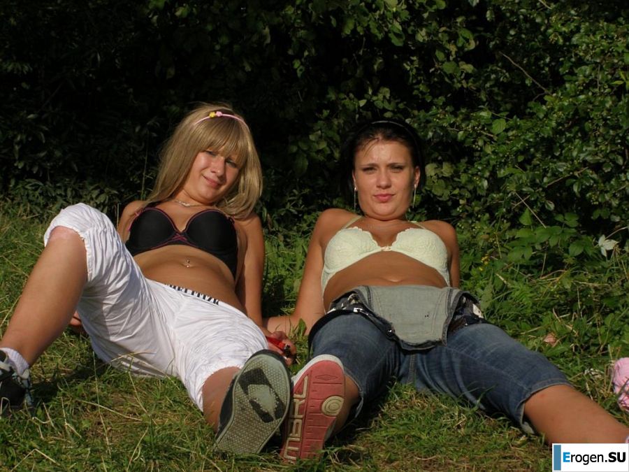 two girlfriends without bras by the river. Photo 39