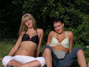 two girlfriends without bras by the river. Thumb 40