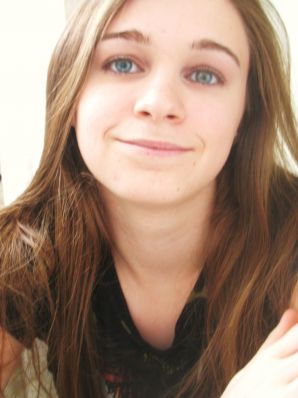 Brunette in revealing outfits and without anything. Thumb 11