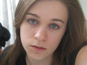 Brunette in revealing outfits and without anything. Thumb 23