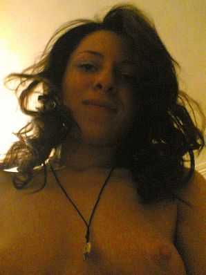 Brunette in revealing outfits and without anything. Thumb 30