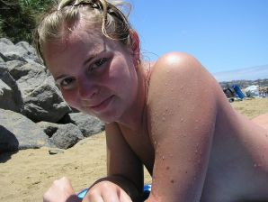 miss positivist on the beach. Thumb 15