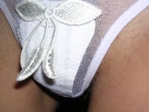 A tanned brunette shines her tits in the morning in bed. Thumb 35