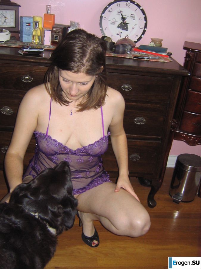 A mature woman posing in a transparent dress in front of a man. Photo 29