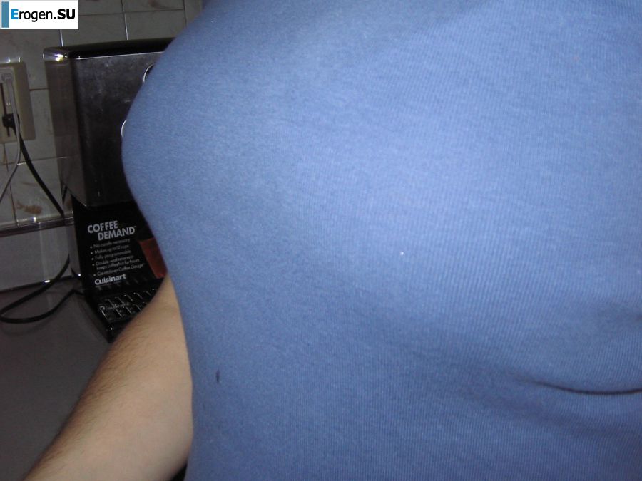 A mature woman posing in a transparent dress in front of a man. Photo 3