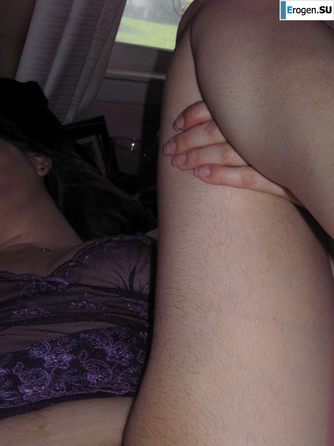 A mature woman posing in a transparent dress in front of a man. Photo 38