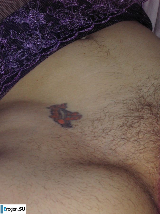 A mature woman posing in a transparent dress in front of a man. Photo 40