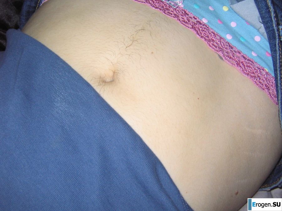 A mature woman posing in a transparent dress in front of a man. Photo 8