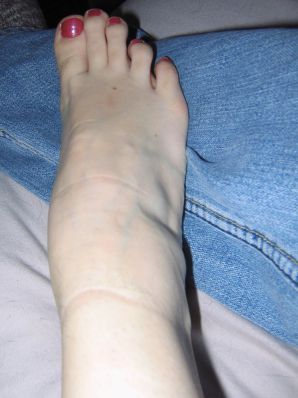 A mature woman posing in a transparent dress in front of a man. Thumb 13