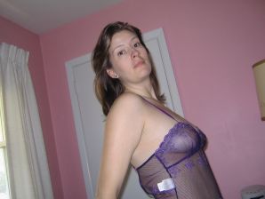 A mature woman posing in a transparent dress in front of a man. Thumb 26