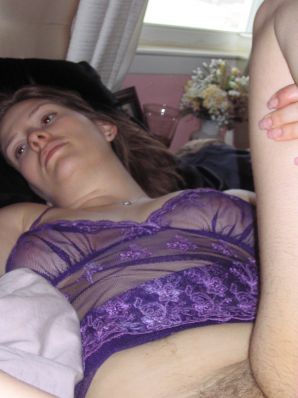 A mature woman posing in a transparent dress in front of a man. Thumb 39