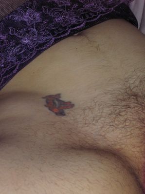 A mature woman posing in a transparent dress in front of a man. Thumb 40