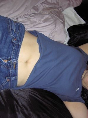 A mature woman posing in a transparent dress in front of a man. Thumb 5